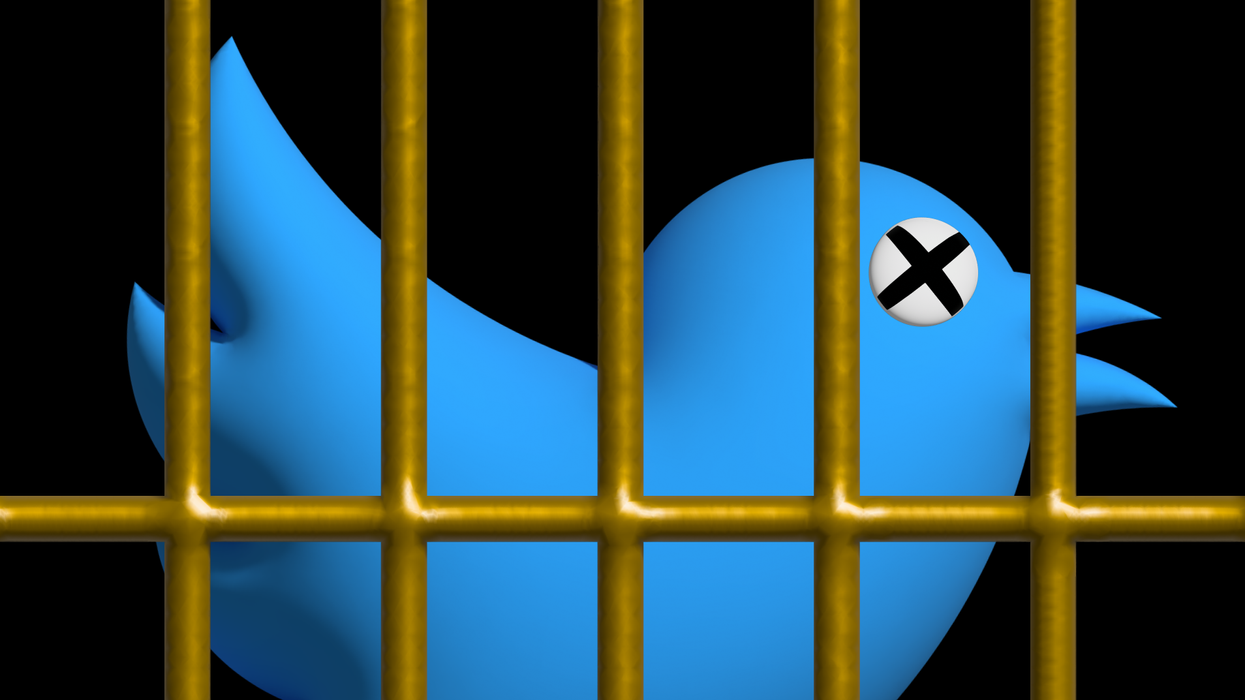An illustration of a blue bird with X for eyes behind the bars of a gold cage. Very close up.